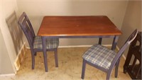Wooden kitchen table with two matching chairs