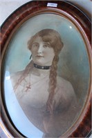 Antique hand coloured photographic portrait
