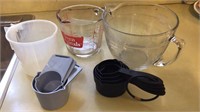 Assorted mixing bowls/ measuring cups