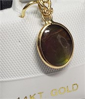 $600 14K Ammolite Pendant