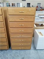 8 drawer oak cabinet 31" wide 61 1/2" tall 22"