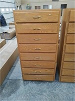 8 Drawer oak cabinet 31" wide 61 1/2" tall 22"
