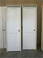 2 New white 2 panel 2-0 x 6-8 doors