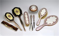 Two enamel vanity sets