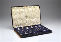 Cased set of English silver spoons
