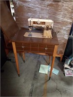 Sewing machine by Singer