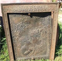 OLD FIRE PLACE FRAME WITH TWO EMBOSSED INSERTS