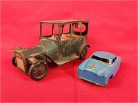Two Vintage Friction Tin Toys