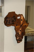 Wall clock shaped as African continent.