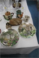Cat ornaments and Royal Albert plates.