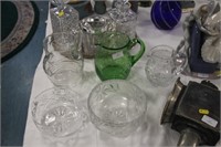 Glass jugs and bowls.