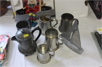 Pewter tankards and Jug