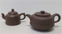 A pair of Chinese Yixing (red clay) Tea Pots