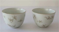 Chinese pair white floral porcelain wine cups