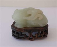 Qing celadon jade carving of a cat