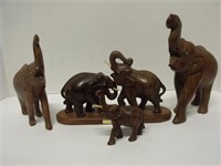 Grouping of 4 Hand Carved Wood Elephant Figurines