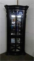 Black Painted Corner Cabinet With Mirror Back And