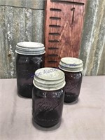 Purple canning jars, one quart and two pints