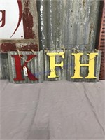 K, H, F tin-backed hanging letters