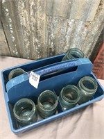Blue canning jars in plastic carrier