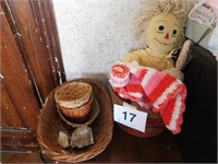 Small red  basket with large rag doll and stuffed