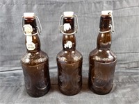 Old Lidded Brown Bottles