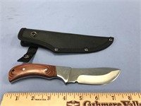 8" skinning knife with 3.75" blade, wooden handle