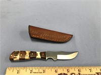 6.5" long skinning knife, 3.25" blade, sectioned w
