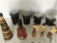Spice Rack, Black Jars with Lids, Etc. U13B