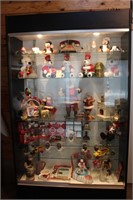 Coca-Cola Collectibles within lighted display