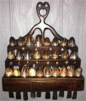 Coin Silver Spoons In Wall Rack
