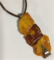 Amber Pendant On Leather Cord