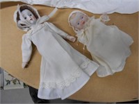 2 Tiny porcelain Dolls 1 is 7"long and 1 is 5"long