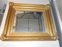 gold painted wood framed mirror