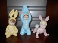 children figurines in bunny costumes