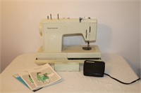 Portable Kenmore model 1560 zigzag sewing machine