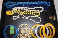 Costume jewelry, beads, bracelets, etc