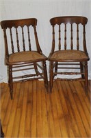 2 Gun stock chairs cane seat