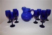 Cobalt blue pitcher and 9 goblets