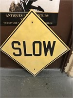 Slow Metal Sign