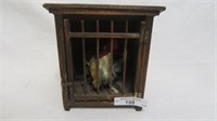 Folk Art wooden chicken in coup toy with squeaker.