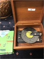 Thorens Music box w/ 10 Disc in box.