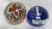 2 paperweights as shown