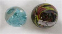 2 paperweights as shown