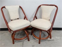 Two Swivel Rattan Dining Chairs
