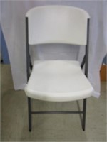 Nice folding white chair by Life Time; pick up