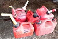Four Plastic Gas Cans