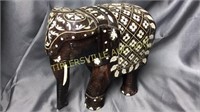 Heavy 8.5” wooden carved elephant with inlay