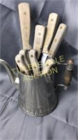 Old kettle with Chicago cutlery knives