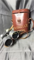 Vintage binoculars in cowhide case